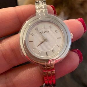 Bulova Rhapsody Watch; Stainless steel bracelet links; 8 diamonds.